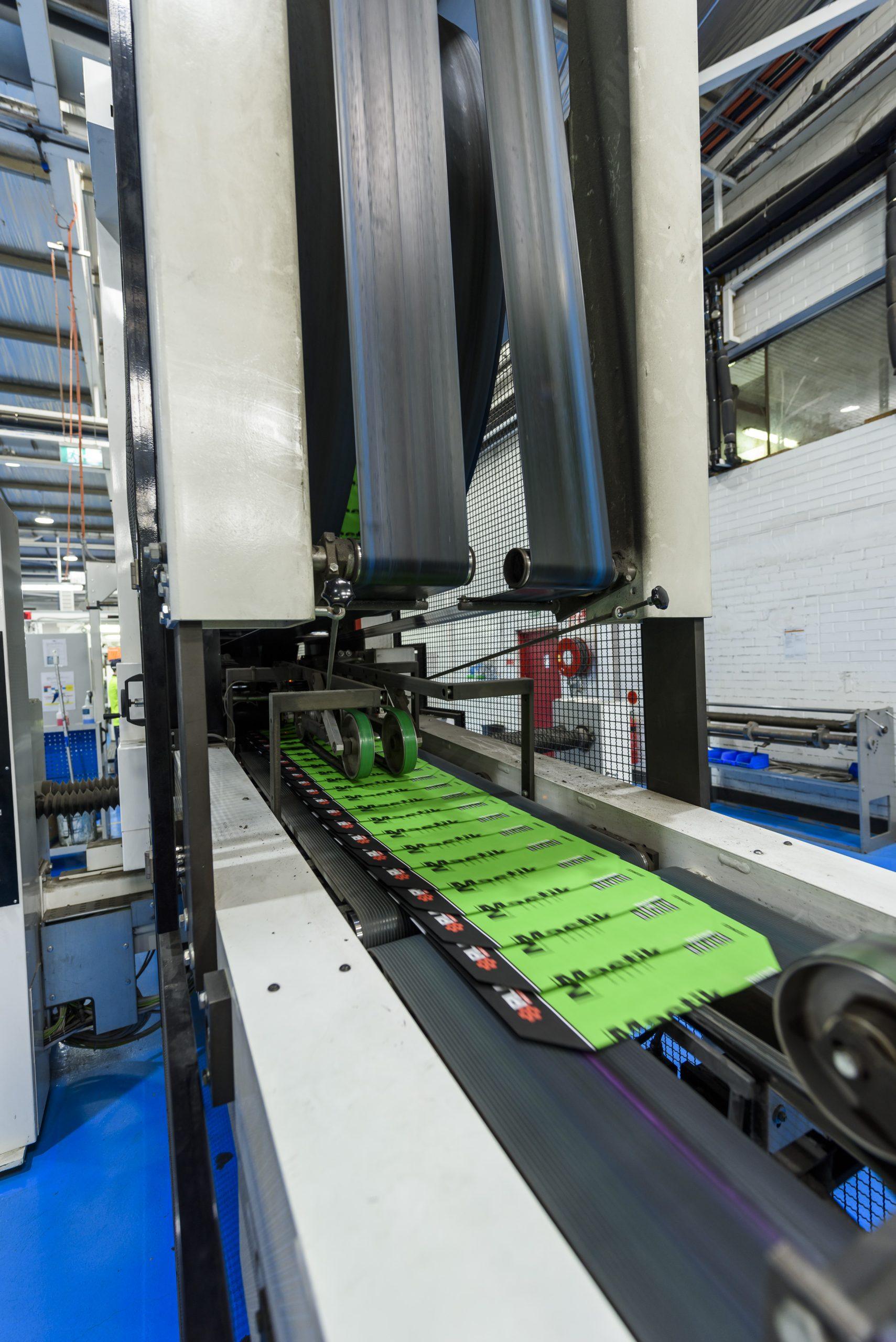 Paper Sacks on a conveyor belt in factory.