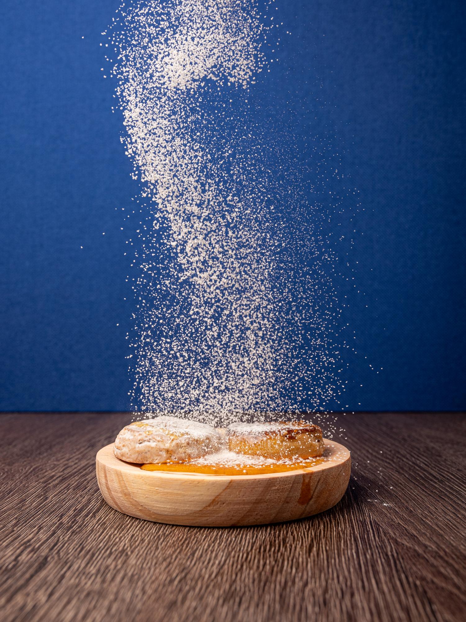 Sprinkled Sugar on pie Food packaging supplies for baked goods like pastries, shown with icing sugar dusted on top.