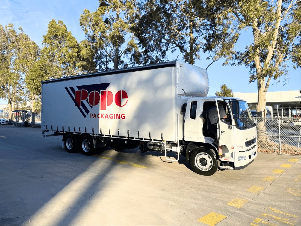 Pope truck leaving dispatch for delivery.